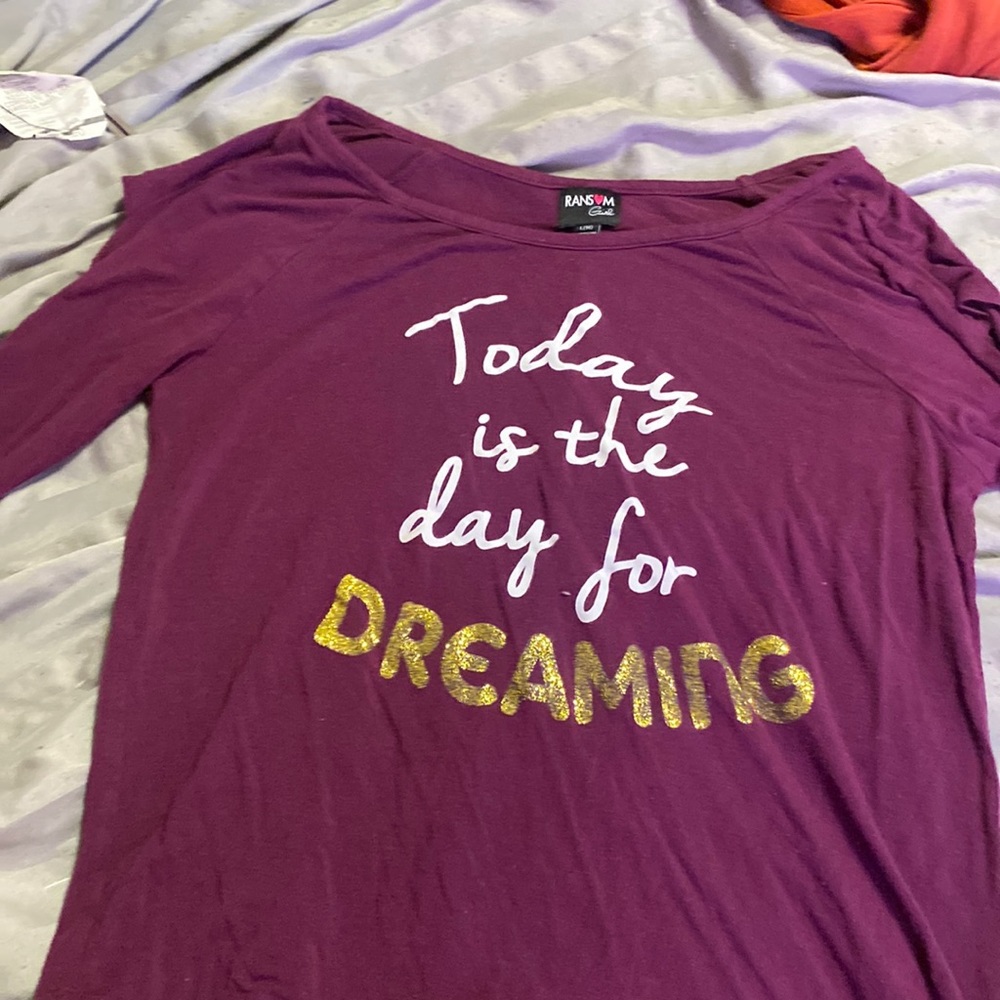 Purple shirt with a quote